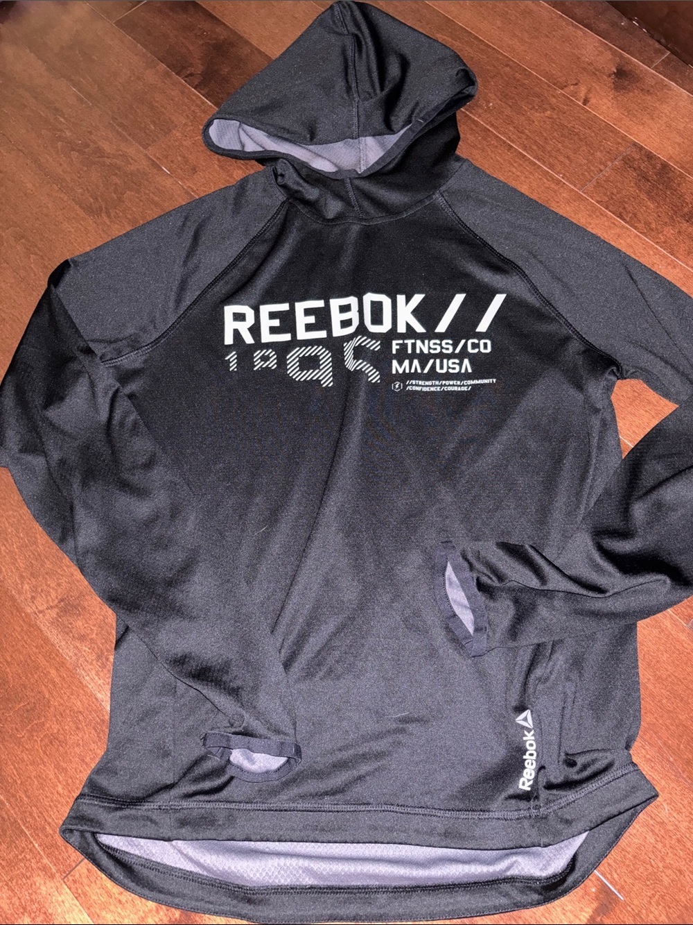 Reebok Black Hooded Pullover mens small fits women’s small
Medium